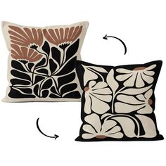 two black and white pillows with brown leaves on them, one in the shape of a flower