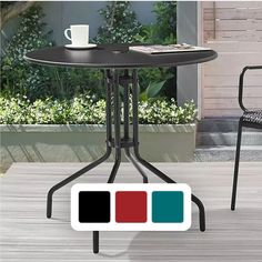 a table with two chairs and a coffee cup on it