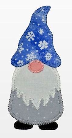 an embroidered gnome with snowflakes on it's head and nose, standing in front of a white background