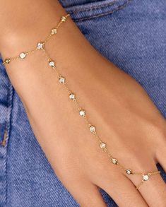 This Diamond Bezel Hand Chain Bracelet is a sparkly way to get your hands on some shine - it's the perfect basic to start your stack party! Nobody can resist a diamond bezel! Details:14k Gold - Available in Yellow, Rose and White GoldAverage diamond weight is 0.46ctLink dimensions: 1mmBezel diameter: 4mmDistance between bezels: 7mmBracelet length is customizable, we recommend 6"-7" Shipping & Returns:Orders can be cancelled only within the first 24 hours.Most of our pieces are made to order, ple Hand Chain Bracelet, Hand Chain, Bezel Diamond, Yellow Rose, Charm Earrings, Ring Bracelet, White Diamond, Gift Necklace, Chain Bracelet