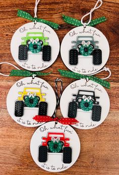 four christmas ornament ornaments with tractors on them