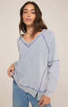 Wrap yourself in the comfort of our knit denim top, made from cozy midweight french terry, given a soft mineral wash. The flattering v-neck design and relaxed fit make this top an easy favorite, season to season. Denim Sweatshirt, Exposed Seams, Knit Denim, Terry Fabric, Favorite Season, French Terry Fabric, Fabric Details, Denim Top, Casual Wardrobe