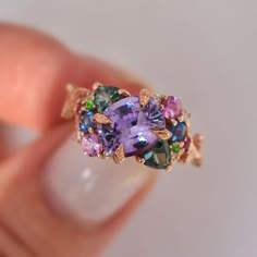 Nature Inspired Cluster Engagement Ring with Purple Sapphire and Gemst – Albrecht Jewellery Ring With Colored Stone, Rose Gold Gemstone Ring, Purple And Gold Engagement Ring, Color Changing Sapphire, Amethyst Cluster Ring, Purple And Green Engagement Ring, Lilac Sapphire Engagement Ring, Cocktail Engagement Ring, Natural Sapphire Ring