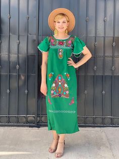 "Floral embroidery artisanal mexican dress, GREEN bohemian kaftan, mexican wedding guest outfit, south american resort wear, grandmacore Gorgeous vibrant floral hand embroidery and flowy fit make this beautiful boho GREEN Mexican maxi dress the perfect long summer kaftan or beach dress Cool and comfortable Mexican long dress is great for everyday wear. Or dress it up for a dazzling night out. Short sleeves have feminine ruffles 100% Cotton. The perfect resort wear for travel Measurements taken f Green Maxi Dress For Traditional Ceremonies, Bohemian Embroidered Maxi Dress For Traditional Ceremonies, Bohemian Short Sleeve Dress For Traditional Ceremonies, Green Floral Embroidered Summer Kaftan, Green Floral Embroidered Kaftan For Summer, Summer Green Kaftan With Floral Embroidery, Green Floral Embroidery Kaftan For Summer, Bohemian Maxi Dress For Traditional Ceremonies, Green Bohemian Embroidered Dress For Spring