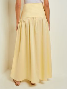 Discover the quality craftsmanship and comfort of Misook's Maxi High-Low Skirt - Flounce Cotton in Pale Gold. All of our designer knitwear and wovens come with complimentary shipping and returns. Cotton Tiered Skirt In Solid Color, Cotton Asymmetrical Skirt For Daywear, Cotton Tiered Skirt With Solid Color, Chic Solid Cotton Maxi Skirt, Asymmetrical Skirt With Pleated Hem For Summer, Long Cotton Skirt With Pleated Hem, Cotton Lined Maxi Skirt, Solid Cotton Lined Maxi Skirt, Summer Asymmetrical Skirt With Pleated Hem