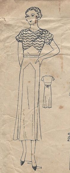 a drawing of a woman's dress on a piece of paper