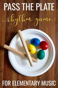 a white plate topped with wooden toys on top of a wooden floor next to text overlay that reads pass the plate rhythm game for elementary music