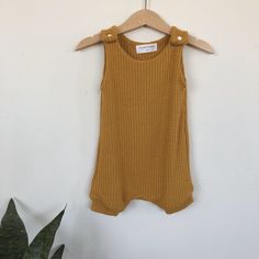 "Our tank top romper collection is your everyday go-to that make dressing baby/toddler a breeze. This buttery-soft waffle material is stretchy and has a slouchy fit for a stylish look. Fastened with plastic KAM snaps on each shoulder. Unbelievably sweet you'll love it when you wear it and miss it when it's in the wash! 0-3 Month: 6-12 pounds // 18-22\" long 3-6 Month: 12-16 pounds // 22-27\" long 6-12 Month: 16-20 pounds // 26-30\" long 12-24 Month: 20-30 pounds // 29-33\" long 2-3T : 28-34 poun Toddler Boy Romper, Spring Rompers, Overalls Shorts, Fall Baby Clothes, Kam Snaps, Tank Romper, Neutral Baby Clothes, Rompers For Kids, Knitted Baby Clothes