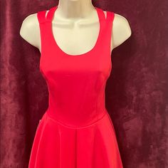 This Classy Little Dress Should Be In Your Closet! It’s Adorable Crisscross Back Adds Just The Accent Needed For That One Of A Kind Look. Half Zip To The Waist. Strawberry Red In Color, But Not Too “Red”. Dress Yourself Or Your Girl In Their Head Turner. Red Spring Dresses With Back Zipper, Red Spring Dress With Back Zipper, Red Dresses With Back Zipper For Spring, Red Dress With Back Zipper For Date Night, Spring Dresses With Flattering Cut For Night Out, Red Sleeveless Mini Dress With Back Zipper, Red Mini Dress With Back Zipper For Night Out, Red Stretch Dress With Back Zipper, Red Dress With Back Zipper For Night Out