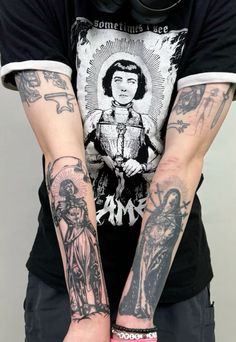 a person with tattoos on their arms