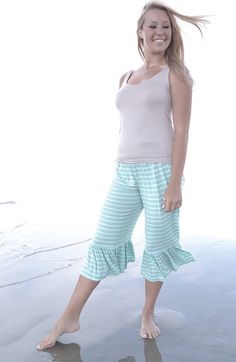 Made with quality cotton lycra. Stretch for easy fit. Ruffle detailing at bottom. wide fixed waistband. Handmade in Southern Calif Machine washable and dryer safe on low heat Small Inseam Waist 14 30 Medium Inseam Waist 15 31 Large Inseam Waist 16 31 1/2 XL Inseam Waist 17 32 2 XL Inseam Waist 18 33 3 XL Inseam Waist 20 34 Stretch Cotton Bottoms With Ruffle Hem, Summer Cotton Capris For Loungewear, Summer Cotton Loungewear Capris, Blue Cotton Bottoms With Ruffle Hem, Casual Cotton Bottoms With Ruffle Hem, Cotton Bottoms With Wide Waistband For Loungewear, Casual Bottoms With Ruffle Hem, Stretch Cotton Capris For Loungewear, Garden Grove