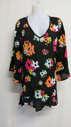 "Georgette Boho Tunic Chiffon Tunic Chiffon Blouse  Sassy Chic! Draping long full sleeves  Deep saturated color with such happy flowers! Size Small   100% Rayon 3/4 sleeves 13\" from under arm Bust 40\" Hip 42\" 34\" length 18\"shoulder Tres Chic!  (Like you!) https://www.etsy.com/shop/BelindasStyleShop" Flowy Multicolor Floral Print Blouse, Floral Print Beach Blouse With 3/4 Sleeves, Floral Print 3/4 Sleeve Blouse For Vacation, Beach Blouse With Floral Print And 3/4 Sleeves, Beach Blouse With 3/4 Sleeves And Floral Print, Multicolor 3/4 Sleeve Blouse For Vacation, Multicolor 3/4 Sleeve Vacation Blouse, Flowy Multicolor Tunic Blouse, Multicolor Flowy Tunic Blouse