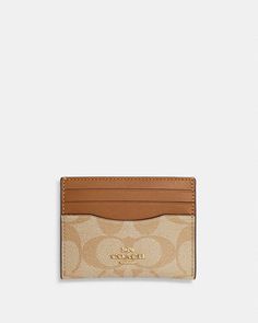 COACH® | Slim Id Card Case In Signature Canvas Classic Beige Wallet With Rfid Blocking, Classic Beige Rfid Blocking Wallet, Classic Beige Wallets With Interior Card Slots, Classic Beige Card Holder For Travel, Classic Beige Bifold Card Holder, Beige Card Holder With Card Slots For Formal Use, Men Stylish Dress, Coach Outlet, Signature Canvas