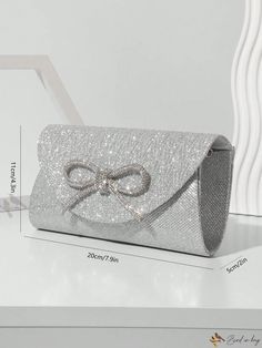 Bird in Bag - Premium Silver Evening Bag with Chain, adorned with Mini Glitter Rhinestone Bowknot: Ideal for Party or Wedding, a Must-Have Hand Bag for Fashionable Women Silver Envelope Evening Bag For Party, Glamorous Envelope Evening Bag For Party, Formal Silver Envelope Evening Bag, Silver Envelope Evening Bag, Elegant Sparkling Bag For Party, Elegant Sparkling Bags For Prom, Elegant Sparkling Party Bag, Elegant Sparkling Party Bags, Silver Bags For Wedding And Party Season