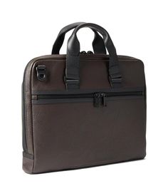 Travel carrying all your essential stuff in the high utility and trendy Tumi® Academy Brief..Durable and highly functional brief crafted using a combination of Ballistic nylon, leather, and PU..Includes the Tumi Tracer®, an exclusive program that helps you reunite with your lost or stolen items..Removable shoulder strap for added practicality..Zippered top closure..Dedicated laptop and tablet compartments..Luggage tag & key clip included..Three exterior pockets including one open pocket on the b Modern Laptop Bag With Zipper Pocket For Work, Modern Laptop Bag For Work, Leather Laptop Bag With Zipper Pocket For Work, Versatile Business Briefcase With Zipper Closure, Functional Briefcase With Leather Trim For Business, Leather Briefcase With Zipper For Work, Functional Leather Trim Briefcase For Business, Functional Business Briefcase With Leather Trim, Modern Leather Briefcase With Leather Trim