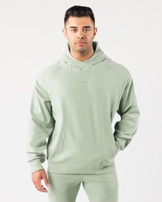 HIGHLIGHTS. Full length hoodie with oversized fit. Crossover cowl-neck with 3-paneled hood. Stretchy fabric with a soft brushed surface Structured font and back panels.. Arm-defining raglan sleeve seams. Unique hem design. Slip pockets. Alphalete union logo in raised silicone on chest in tonal FIT SUGGESTION This item has an oversized fit. Model is 5’10”/177.8cm, wearing a size L. with a 44.5”/113cm chest. MATERIALS AND WASHING DIRECTIONS. 95% Cotton, 5% Elastane.. We recommend washing inside-ou Union Logo, Lounge Looks, 4 Way Stretch Fabric, Sporty Look, Hoodie Top, Stretchy Fabric, Raglan Sleeve, Cowl Neck, Athleisure