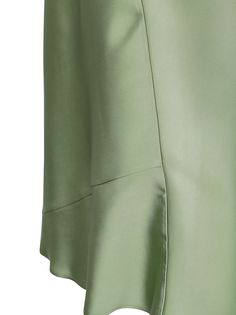 Slip skirt with sideways cut Elastic waist Colour: green Composition: 100% viscose Elegant Green Mini Skirt For Summer, Green Relaxed Fit Flared Mini Skirt, Elegant Green Lined Mini Skirt, Elegant Green Flared Mini Skirt, Chic Green Knee-length Mini Skirt, Chic Flowy Green Skirt, Green Silk Lined Skirt, Chic Green Viscose Bottoms, Green Relaxed Knee-length Mini Skirt