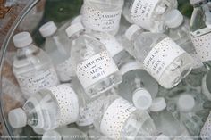 many empty water bottles in a glass bowl