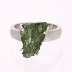 SpecificationsItem Code: SR996Size US: 8Weight: 35 Carats (7 grams) Unique Qualities Expertly made with authentic Czech moldavite, this exquisite ring is crafted from premium sterling silver. Featuring a one-of-a-kind size 8 design, this ring is a must-have addition to any jewelry collection. Elevate your style with a touch of refinement and grace with this remarkable moldavite ring. Moldavite Ring, Moldavite Jewelry, Moldavite Stone, Gemstone Properties, Rare Stone, Elegant Ring, Size 10 Rings, Multi Stone Ring, Sterling Silver Bands