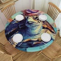 the table is set with plates and place settings for two people to sit at it