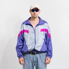 Vintage 90's multi colorblock oversized track jacket with a front zip - 2 outer pockets - lined - material: shell - 100% nylon; lining - 65% polyester 35% cotton SIZE from the tag: 5 Best fits men: XL MEASUREMENTS chest circumference: 55 inches (140 cm) length: 24 inches (61 cm) sleeve length from the neck: 31 inches (79 cm) The model is 6'1" (186 cm), measures 41-35-39 (104-88-100 cm) and typically wears clothing in size L CONDITION - 8/10 - The jacket in great pre-owned vintage condition. Wash Fits Men, Track Jacket, Track Jackets, Mens Fitness, Color Blocking, Mens Jackets, Art Collection, Bathing Beauties, Jackets & Coats