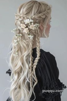 a woman with long blonde hair and flowers in her hair