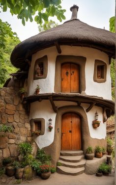 an unusual house with steps leading up to the front door and two windows on each side