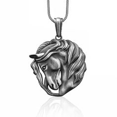 These 925K Sterling Silver Maned Horse Necklace photos are taken with original and every item has handmade engraving details. It's very elegant and classy for everyday use but also can be preferred as a gift for friends and family for an eternal memorial. We prepared a new collection for your loved ones which is a gift selection from BySilverStone and you can find the best present for every occasion.  BySilverStoneTeam works to complete the customer's buying experience with relief and safety. ★I Luxury Silver Necklace With Engraving Option, Luxury Sterling Silver Necklace With Engraving Option, Antique Silver Pendant Necklace With Polished Finish, Classic Etched Necklace For Collectors, Horse Pendant, Animal Necklace, Horse Necklace, Silver Horse, Horses Pendant