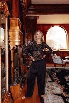 Model wearing a long sleeve black lace bodysuit with flowy black silk pants Black Silk Pants Outfit, Flowy Silk Pants, Silk Pants Outfit, Black Silk Pants, Gooseberry Intimates, Money Outfit, Black Lace Bodysuit, Comfortable Pants, Outfit Inspiration Fall