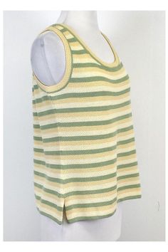 This striped knit top is perfect for casual days. Wear it with shorts or a skirt for a relaxed look. Size Medium Slips on Scoop neckline Shoulder to Hem 22.25" Striped Crew Neck Tops For Vacation, Summer Striped Ribbed Tops, Striped Knit Tops For Vacation, Spring Striped Ribbed Knit Top, Striped Knit Tank Top For Summer, Casual Striped Tank Top For Day Out, Green Horizontal Stripe Summer Top, Summer Striped Crew Neck Knit Top, Striped Crew Neck Knit Top For Summer