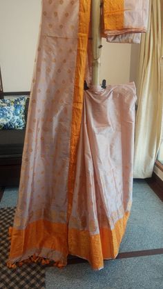 Welcome to our shop, where we take pride in offering you the finest craftsmanship and exquisite textiles. Introducing our pure Muga silk Mekhela Chador, a timeless masterpiece that beautifully combines tradition and elegance. Handwoven with care and precision, this Mekhela Chador is crafted from pure Muga silk, sourced from the silkworm Antheraea assamensis, which is indigenous to Assam, India. Muga silk is known for its lustrous golden hue, unparalleled sheen, and incredible durability. It is c Eid Art Silk Pre-draped Saree With Pallu, Diwali Katan Silk Pre-draped Saree In Traditional Drape, Anarkali Style Raw Silk Pre-draped Saree With Self Design, Traditional Art Silk Pre-draped Saree For Diwali, Transitional Season Tussar Silk Sharara With Cutdana, Transitional Tussar Silk Sharara With Cutdana, Tussar Silk Anarkali Set With Cutdana, Festive Tussar Silk Sharara With Traditional Drape, Festival Silk Kurta With Cutdana