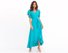 "Turquoise wrap around dress, maxi dress, long dress, wedding guest dress, formal longsleeve dress, evening dress, elegant dress, blue dress, maxi dress Dress style - Wrap around dress Material - 100% viscose IMPORTANT INFORMATION PAYMENTS There is no need to have an account on PayPal to pay for your order on Etsy. You can pay by your _credit card_. This is how to do that: when you get to the PayPal payment page, please click the button \"Pay with a Bank Account or Credit Card\" (below blue \"Lo Flowy Maxi Dress For Wedding Guest, Flowy Maxi Length Wrap Dress For Party, Flowy Maxi Wrap Dress For Party, Blue Flowy Maxi Dress For Wedding Guest, Flowy Maxi Wrap Dress For Evening, Elegant Light Blue Flowy Dress, Blue Maxi Evening Dress For Summer, Blue Maxi Length Summer Evening Dress, Elegant Blue Floor-length Maxi Dress