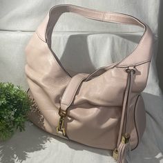 G.I.L.I. Blush Pink Verona Leather Hobo Bag. Beautiful, Good Condition Gili Verona Light Pink Purse With Gold Hardware. Piston Closure With Little Button For Closing, Three Pockets Inside One Of Them With Zipper. Cute Tassel And Gold Lock Detail. Never Used, Like New A Little Over 11 Inches Top To Bottom, 9.5 Inches From Top Of Shoulder Strap To Top Of Bag, 16 3/4 Inches In Width At Widest And 15 Inches In Width At Bottom. Shoulder Bag Leather Fringe Handbag, Light Pink Purse, Gucci Vintage Bag, Leather Fringe Bag, Fringe Handbags, Shoulder Strap Bag, Hobo Style, Ostrich Leather, Pink Purse