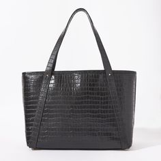 Fabricated in our croc embossed leather, this tote is as beautiful as it functional. With a complete zipper closure and an interior zip pocket you'll be able to keep all your daily contents safe, laptop included! We also love how structured it is- it will stand up on it's own even when it isn't full (and don't worry about scratching the bottom- it has feet). Luxury Everyday Shoulder Bag With Crocodile Pattern, Luxury Crocodile Pattern Everyday Shoulder Bag, Modern Shoulder Bag With Crocodile Pattern For Daily Use, Modern Crocodile Pattern Shoulder Bag For Daily Use, Everyday Leather Bag With Crocodile Pattern, Modern Crocodile Pattern Tote Shoulder Bag, Zip Tote, Gold Zipper, Embossed Leather