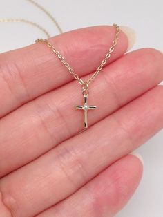 925 Sterling Silver Dainty Cz Cross Pendant Necklace   - Metal: 925 Sterling Silver (Finish: Yellow Gold Plated) - Stone: Clear Cubic Zirconia (1 Cz), Round - Shape: Cross - Pendant Dimension: 9mm(0.35 in) x 6mm(0.24 in) x 1mm, Thickness 1mm (Please note that the cross' width/thickness is 1mm, VERY TINY/THIN.) - Light Cable Chain: 18" Adjustable (16" + 1" + 1"), Lobster Clasp - Color: Gold Gold Cross Necklace Aesthetic, Gold Cross Necklace For Women, Cross Necklace Gold, Diamond Cross Necklace Gold, Dainty Cross Necklace, Tiny Cross Necklace, Silver Cross Necklace, Sterling Silver Cross Necklace, Tiny Cross