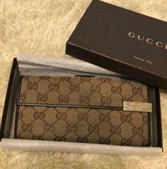 Auth Gucci Fold Purse #7210 Long Wallet   GG Brown Canvas Leather Italy  Description Condition: B (Good Condition But Signs of Small Scratches and / or Stains) Accessory: Box Color Brown Size (Approx): W 19cm H 9.5cm D 2.5cm Size (Approx) : W 7.49inch H 3.75inch D 0.99inch Condition: B  N : (New)  S : (Almost brand new)  A : (Great condition Light signs of use with tiny scratches and/or stains)   B : (Good condition but signs of small scratches and/or stains)  C : (Noticeable signs of use with s Classic Gucci Wallet For Travel, Classic Gucci Travel Wallet, Gucci Brown Formal Wallet, Formal Brown Gucci Wallet, Gucci Bifold Wallet With Original Box, Classic Gucci Rectangular Wallet, Classic Gucci Bifold Wallet, Gucci Wallet Women, Gucci Wallet