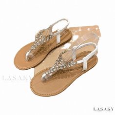 Lasaky - Elegant Flat Sandals with Rhinestone Embellishments and Toe-Strap Design Silver Embellished Sandals For Vacation, Embellished Silver Sandals For Vacation, Silver Embellished Vacation Sandals, Spring Crystal Open Toe Sandals, Silver Toe Post Sandals With Rhinestones, Silver Rhinestone Toe Post Sandals, Silver Crystal Sandals, Open Toe Crystal Sandals With Bling, Crystal Open Toe Sandals With Bling