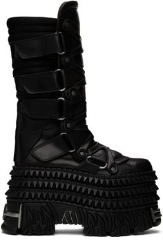 Calf-high buffed leather boots in black. · Graphic rivets throughout · Graphic hardware at toe, heel, and sole · Cinch velcro closure at sides · Padded tongue · Quilted jersey collar · Buffed leather lining · Studded platform rubber midsole · Treaded rubber sole · Platform: H4.5 · Heel: H5 Part of the VETEMENTS X New Rock collaboration. Supplier color: Black Leather Platform Boots With Studded Outsoles For Concert, Alternative Leather Platform Boots With Spikes, Leather Platform Boots With Spikes In Alternative Style, Leather Platform Boots With Spikes For Concert, Spiked Leather Platform Boots For Concerts, Gothic Boots With Studded Outsoles For Concerts, Edgy Platform Boots With Rubber Sole, High-top Leather Platform Boots With Rivets, Leather Rock Boots For Streetwear