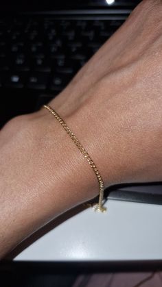 This 18k gold bracelet will highlight your wrist with its shine and finesse. It can be worn by a woman or a man who has small wrists, the bracelet measures 13cm in circumference. Dainty 14k Gold Jubilee Chain Bracelet, Everyday Yellow Gold Diamond Bracelet With Delicate Chain, Gold Plated Minimalist Chain Bracelet, Minimalist Gold Tennis Bracelet With Adjustable Chain, Gold Minimalist Tennis Bracelet With Adjustable Chain, Minimalist Gold Plated Chain Bracelet, Adjustable Minimalist Sterling Silver Bracelet In Yellow Gold, Adjustable Yellow Gold Sterling Silver Minimalist Bracelet, Dainty Gold Tennis Bracelet For Formal Occasions