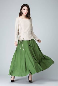 "This chic light green maxi skirt created with a soft linen, design with a fit and flare silhouette for a feminine feel , completed with a fitted waist for a defined figure. DETAIL * Soft linen * 50% linen , 50 cotton * No lining * Seam pocket * Right side zipper closure * Ankle Length * A Line skirt, button front skirt * Wash by hand or machine with cold water * Perfect spring, summer, autumn SIZE GUIDE Size vary between Brand and Country Please get your body measurement with our Size Guide And Spring Maxi Skirt With Buttons, Spring Flowy Buttoned Maxi Skirt, Spring Buttoned Flowy Maxi Skirt, Spring Flowy Maxi Skirt With Buttons, Spring Midi Maxi Skirt With Buttons, Flowy Buttoned Maxi Skirt For Summer, Spring Linen Skirt With Buttons, Green Buttoned Skirt For Summer, Green Linen Maxi Skirt