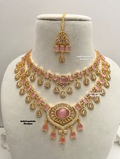 2 layered American Diamond Necklace Set in golden color comes with earrings and Tikka / CZ Necklace/Indian Jewelry/ Reception Jewelry/ Bollywood Jewelry/ 2 two tier necklace set/pink All items are shipped from Brampton, Ontario, Canada. If you need your item by a certain day, please reach out to us for express delivery option We kindly request to consider minor variations in colors, shades, textures as pictures displayed may slightly vary from the actual product due to digital image limitations. Pink Diamond Jewelry Set, American Diamond Necklace Set, Pink Diamond Jewelry, Brampton Ontario, Diamond Jewelry Set, American Diamond Necklaces, Tiered Necklace, Colors Shades, Necklace Indian