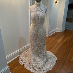 a white dress on display in a room