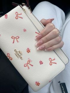 #bows #coquette #nails #coquettenails #nailidea #coach #wallet #coachwallet Coquette Nails, Bow Nails, Bows Coquette, Pink Lifestyle, Hot Bags, Cute Wallets, What In My Bag