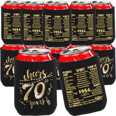 six black can coolers with gold lettering and numbers on the front, one has an age