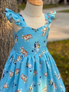 ❤️💌✨Beautiful cartoon inspired dress, homemade with cotton fabric! 2 layers in the skirt. elastic in the weist (back side) 🚨NOTE: the bow not included in the price of the dress, order separately. classic hair clip 4" inch This dress is perfect for any occasion: ✨-Casual wear ✨Birthday Party ✨Photoshoot ✨Vacation If you have any questions message me. The orders are shipped in approximately 5-7 business days, if you need your order sooner, please inquire about a rush fee. All products in my store are handcrafted with love by me ❤️💌 For more information about our products such as photos and designs please follow us on Instagram as @alinnasboutiquevip Whimsical Blue Dress For Dress-up, Whimsical Blue Dress For Dress-up Occasions, Light Blue Sleeveless Birthday Dress, Light Blue Sleeveless Dress For Birthday, Cotton Summer Dresses With Cartoon Print, Summer Cotton Dresses With Cartoon Print, Whimsical Blue Dress For Birthday, Blue Cotton Dress For Dress-up, Sleeveless Blue Birthday Dress