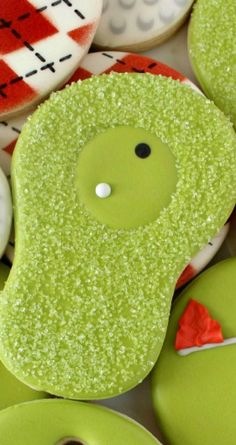 some green and white decorated cookies with buttons