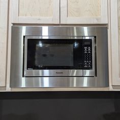 the microwave is built into the wall in the kitchen