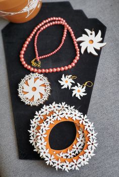 These handmade and hand-painted wooden jewelry sets are inspired by tropical flowers. Excellent addition to your traditional/ethnic outfits. Adorable gift item, too! Bangles are made to match your perfect fit, they vary from sizes: 2.2 -2.8 size 2.2== 2.125 inches size 2.4==2.25 inches size 2.6==2.375 inches size 2.8== 2.5 inches Traditional Handmade Flowers Jewelry As Gift, Orange Jewelry With Wooden Beads As A Gift, Traditional Wooden Beads Jewelry For Crafting, Orange Jewelry With Wooden Beads For Gifts, Traditional Wooden Beads For Crafting Jewelry, White Hand Painted Flower Jewelry, Hand Painted White Flower Jewelry, Hand Painted Wooden Jewellery, Unique Hand Painted Flower Jewelry