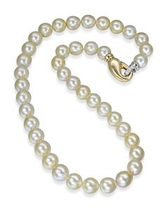 Golden South Sea pearl necklace with 18 karat yellow and white gold diamond (0.08 CTW) clasp. 41 pearls each between 10.0-11.5mm. 19.0″ long. Luxury Timeless Yellow Gold Pearl Necklace, Luxury High Luster Yellow Gold Pearl Necklace, Luxury Yellow Gold Pearl Necklace, Formal White Single Strand Diamond Necklace, Classic Pearl Diamond Necklace For Formal Occasions, Classic Formal Pearl Diamond Necklace, Classic Pearl Necklace With Diamond Accents, Classic Diamond Pearl Bracelet For Formal Occasions, Classic Diamond Necklace With Pearl Chain For Formal Events