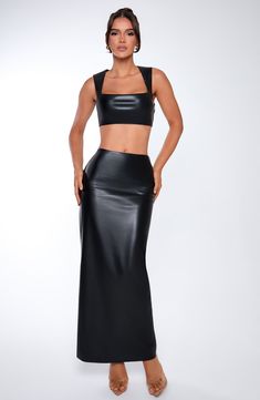 Amp up the drama in Odetta, a sleek, sexy maxi cut from soft faux leather with a mid rise fit, pencil shaped skirt and split to the centre back. Style her up with the Amaya crop or a bodysuit. 



Colour: Black.

Premium faux leather with slight stretch.

Fully lined.

Mid rise.

Pencil shaped skirt.

Split to centre back.

Invisible zip fastening.

Maxi length.

Model is an XS and is wearing an XS.

 Size: XS, S, M, L, XL, XXL Square Neck Design, Split Long Dress, Loungewear Dresses, Maxi Dress Sale, Maxi Dress Navy, Jumpsuit Shorts Rompers, Invisible Zip, The Drama, Black Maxi Dress